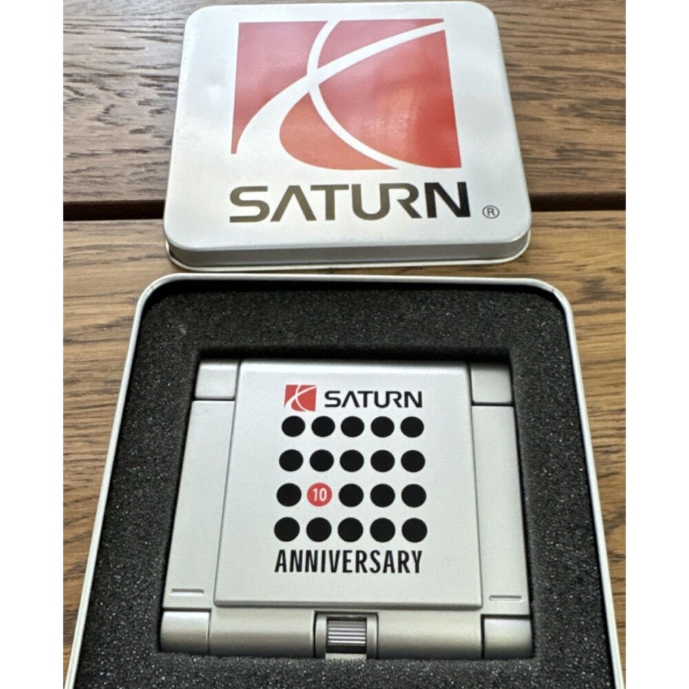 Saturn Digital Clock Radio World Time Alarm Calculator Silver Black Anniversary